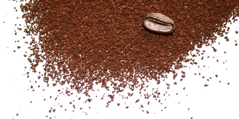 Coffee on tap - grounds and a single bean