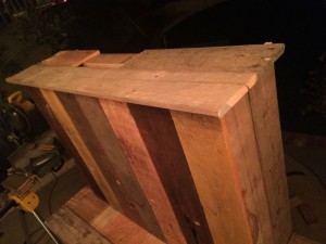 Finishing work around the top of the beer bar
