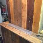 Fitting the drip tray on the bar top