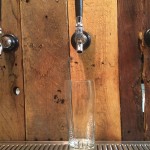 Shot of bar with faucets installed and glass in place (showing fitment)