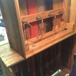 Back view of bar showing beverage lines and beer shanks